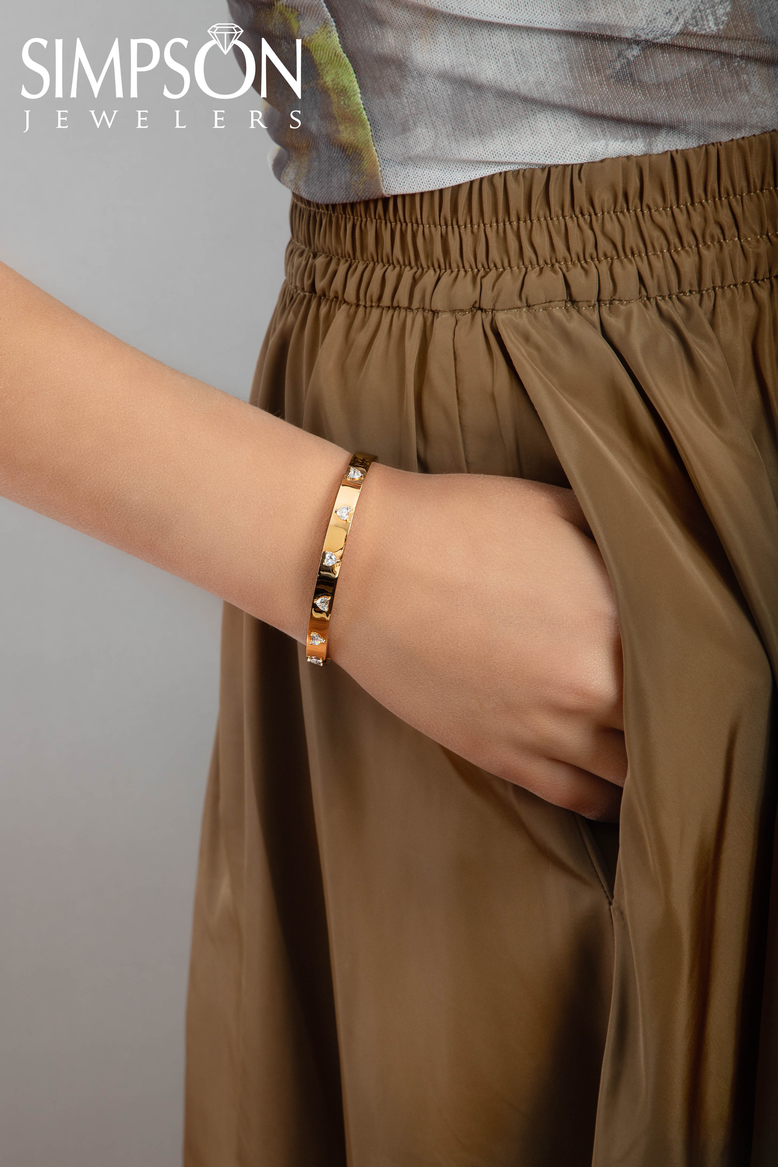 Rose Gold Bangle with Heart-Shaped Diamonds